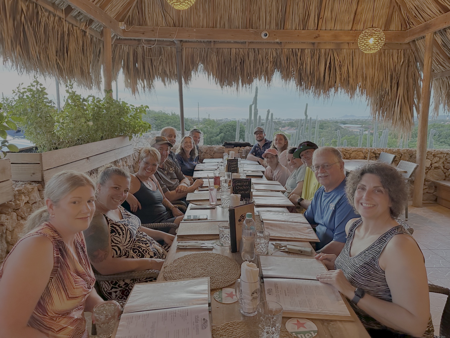 Group photo at an outdoor restaurant.